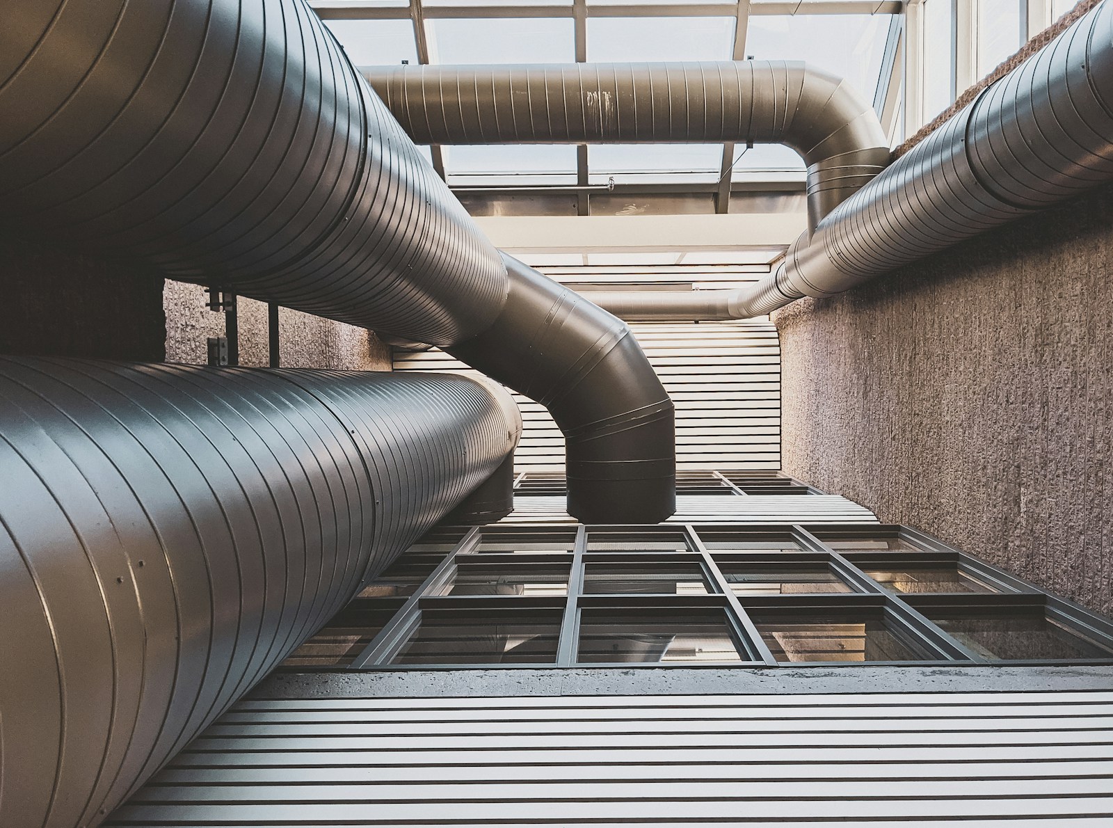 Photo by Sigmund black and gray metal pipe